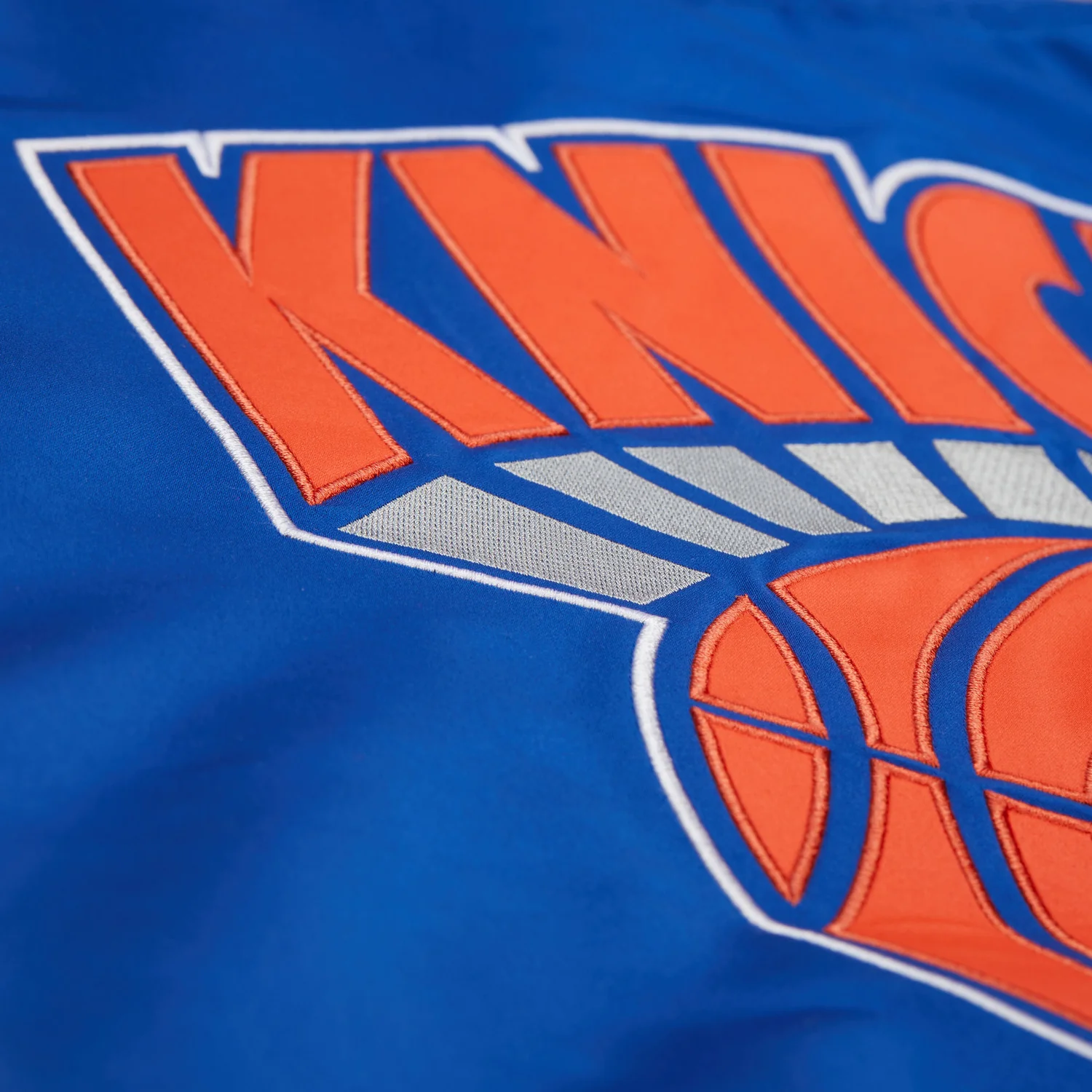 Mitchell & Ness Knicks Team Origins Royal/Orange Satin Jacket - Image 7